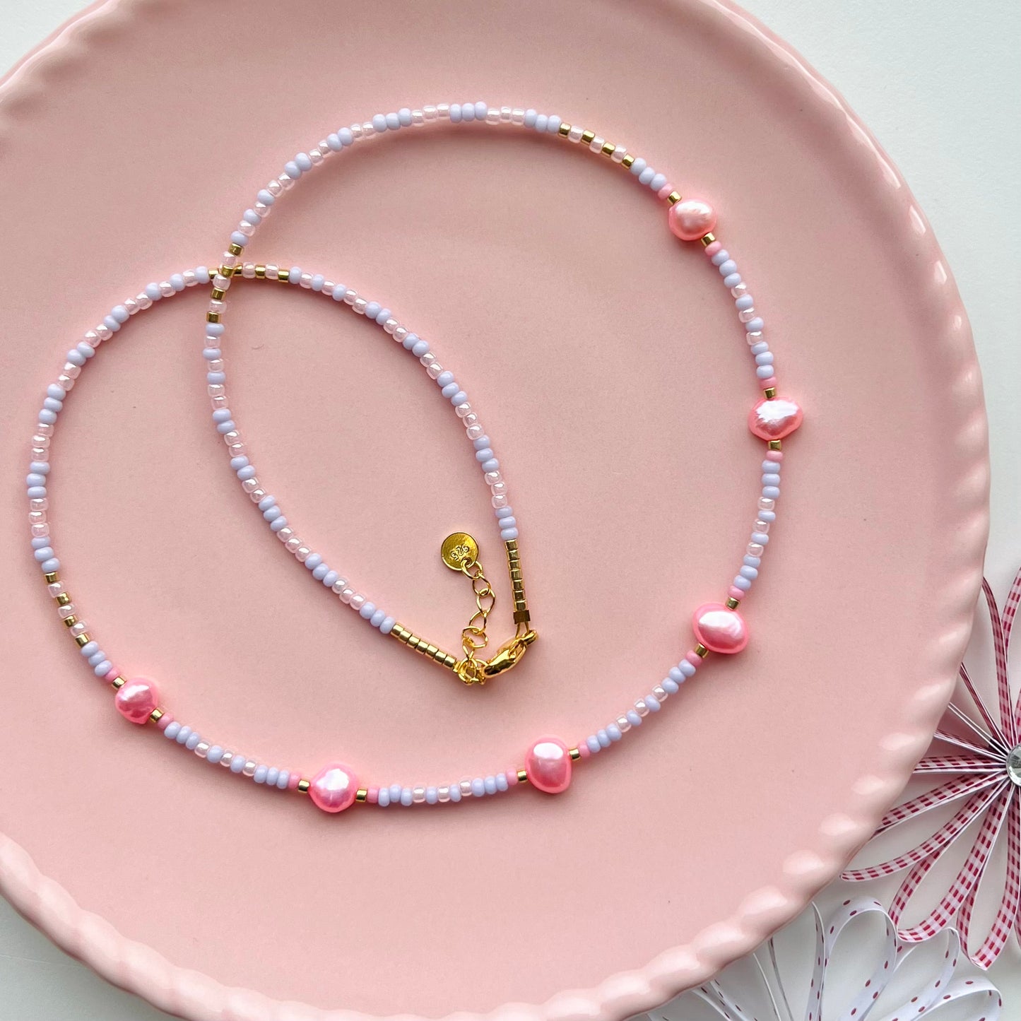 Unika-halskæde med lyserøde ferskvandsperler