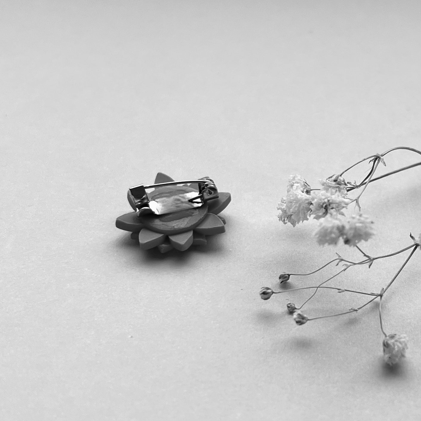 Blomster-broche