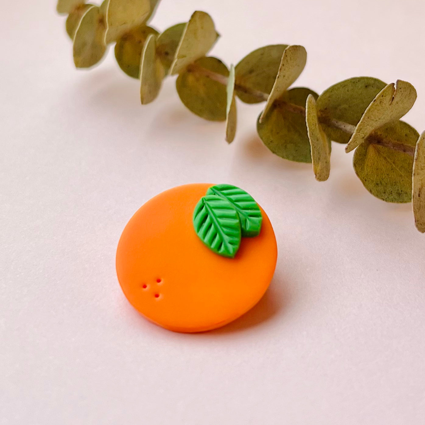 Appelsin-broche