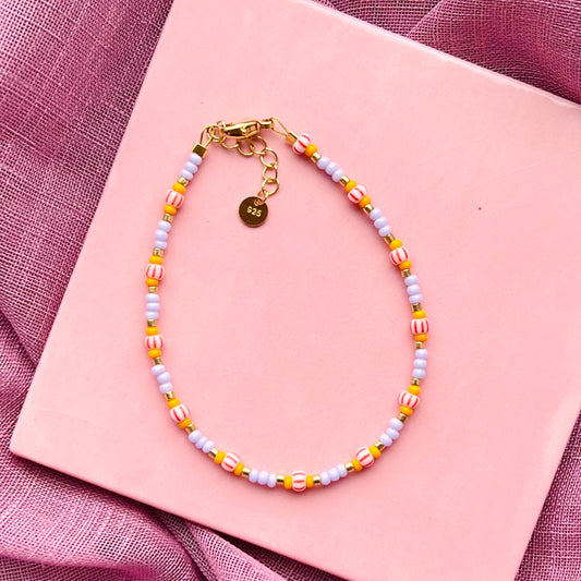 Lilla/Orange Armbånd